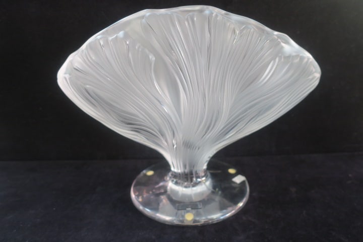 LALIQUE Heay Crystal "ICHOR" Vase:: Model 12477. Engraved "Lalique France" Mark. Frosted Fan Shape with Raised Pattern. 9 7/8"T, 13"W. Weighs 13 3/4 lbs. Original Sticker on Foot.