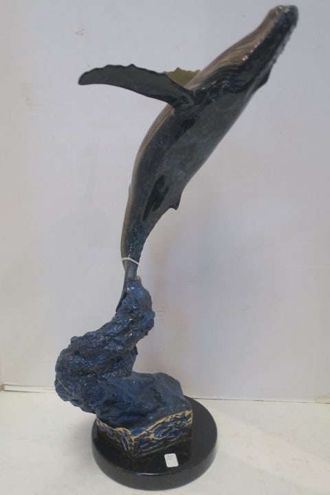 ROBERT WYLAND Patinated Bronze Whale Sculpture:: Breaching Humpback Whale Rises to the Surface. Limited Edition 167/353, Signed and Numbered on Wave. 19"T on Black Marble Base. Wyland is Best Known for His Murals on Public Buildings.