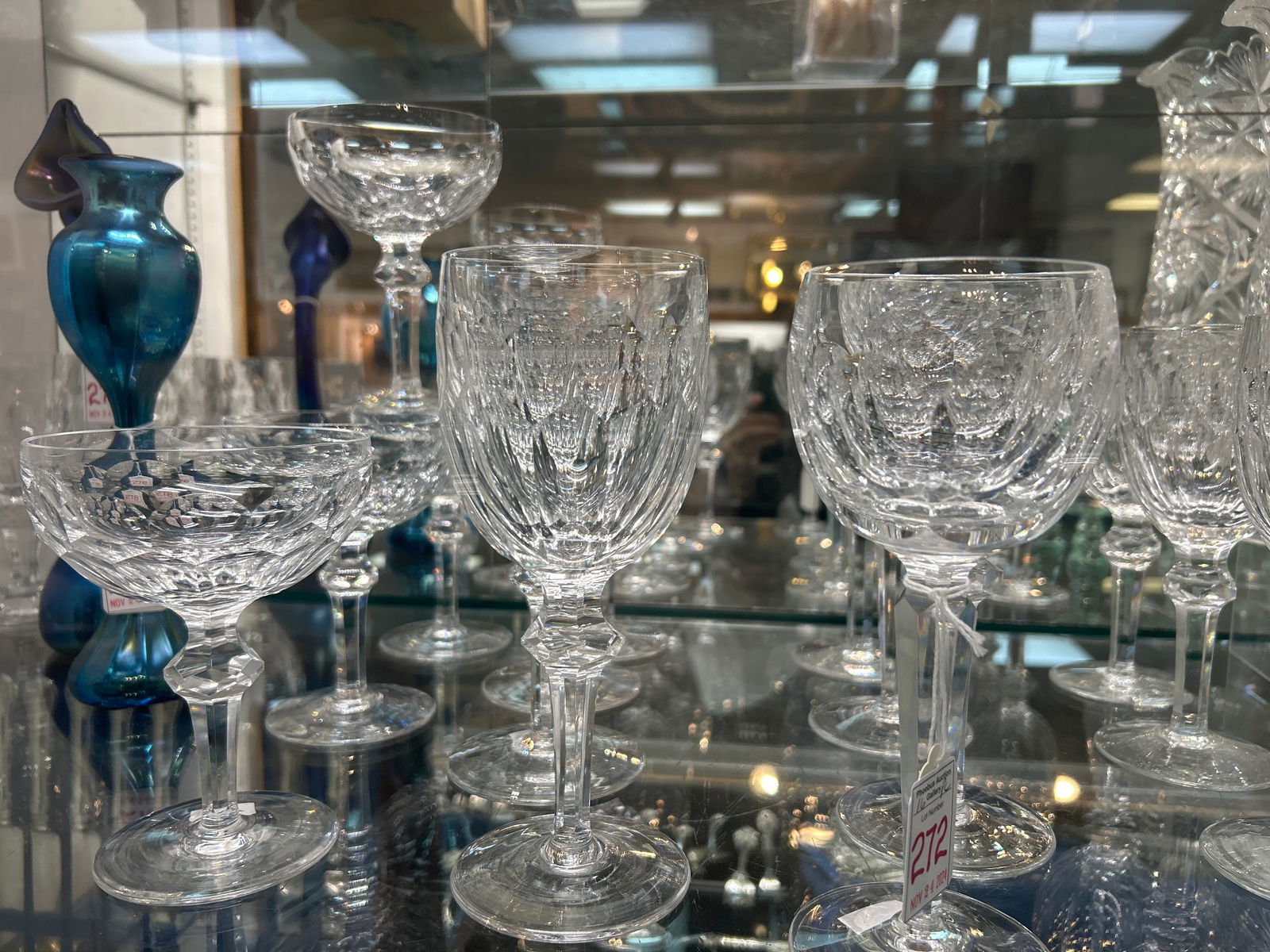 WATERFORD "Curraghmore" & "Sheila" Crystal Stems:: Curraghmore with Cut Sides and Knobbed, Paneled Stems. Includes Four Each 5 1/2"T Sherbets/Champagnes, 7 1/2"T Water Goblets and 7 1/2"T Claret Wines. Two 7 1/2"T Water Goblets and 7 1/2"T Claret Wine