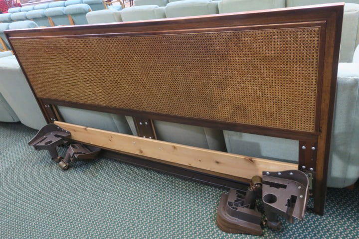 King Size Bed with Caned Headboard: All Pieces Present, Ready to Set Up. No Footboard.?Bed is on Rollers and in Very Good Condition