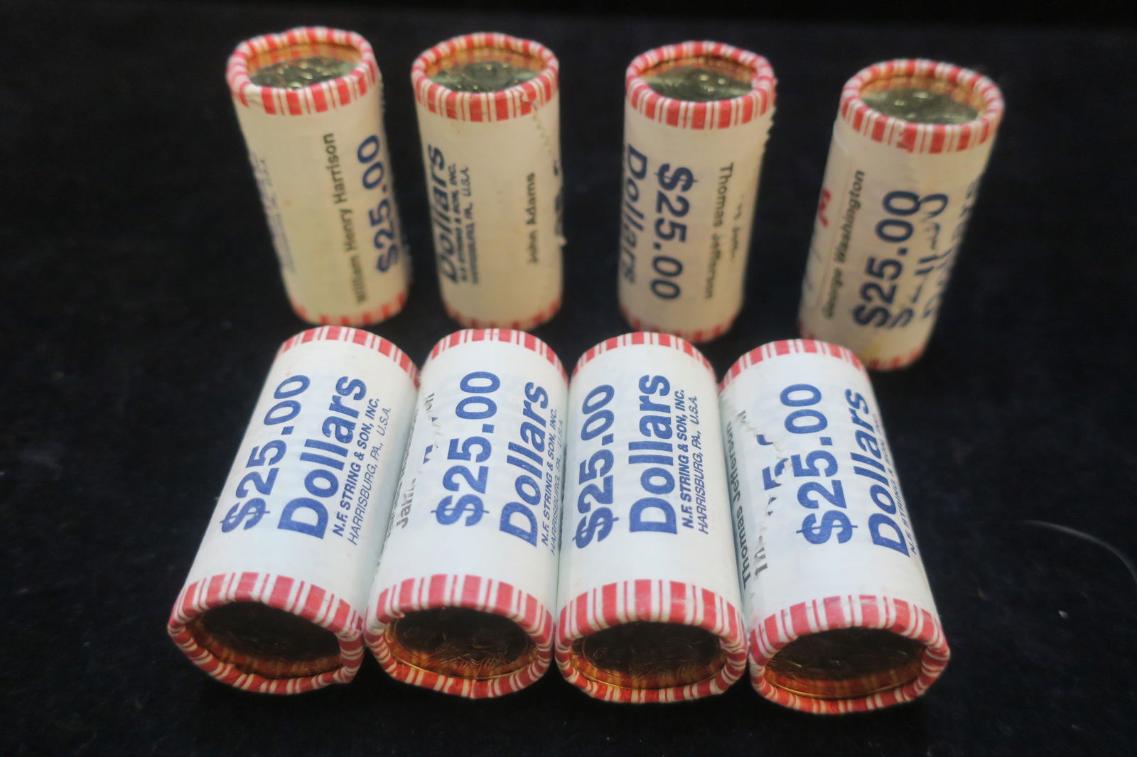 Seven Rolls of Dollar President Coins:: Eight Rolls CA 2007 from US Mint. Bronze Coins Feature Jefferson John Adams, WH Harrison, Madison and Washington. Face Value $200.