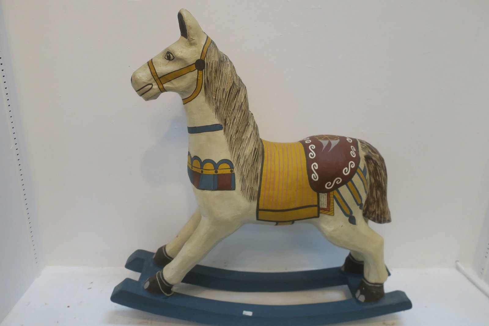 Painted Papier Mache Rocking Horse: Multicolored Molded Figure is 26"L X 25"T. Stands on 2 Rockers. Decorative Use Only. Some Chips to Paint.