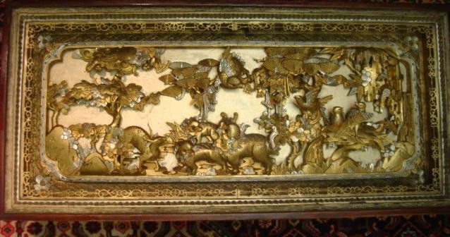 Fine High Relief Carved Asian Wooden Panel: Fine High Relief Carved Asian Wooden Panel: Three Dimensional Figurative Panel Depicting Birds, Deer, and Foo Dogs Emerging from Foliage. Brightly Painted Gilt and Silver. Serves as Wall Hanging or Ha
