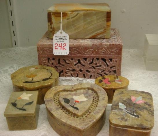 Seven Onyx, Marble and Soap Stone Boxes:: Seven Onyx, Marble and Soap Stone Boxes: Onyx Box is 2 1/4"T, 4 1/2" X 2". Carved, Pierced Pink Marble Box with Hinged Lid is 3"T, 6" X 4". Five Soapstone Boxes with Stone and Mother of Pearl Inlay. (