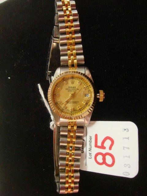 Replica ROLEX Oyster Perpetual Datejust Ladies Watch:: Replica ROLEX Oyster Perpetual Datejust Ladies Watch: Stainless Steel Case with Fluted Bezel and Rhinestone Hour Markers. Gold Dial, Jubilee Bracelet. Date Display at 3:00 (200-300)
