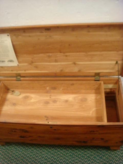 Lane Cedar Chest: Lane Cedar Chest Made in Virginia. Sliding Lift Out Till with Hinged Lid. Has Key, On Wooden Castors. Original Paperwork. 38"W X 16 1/2"D X 16 1/2"T. (-)