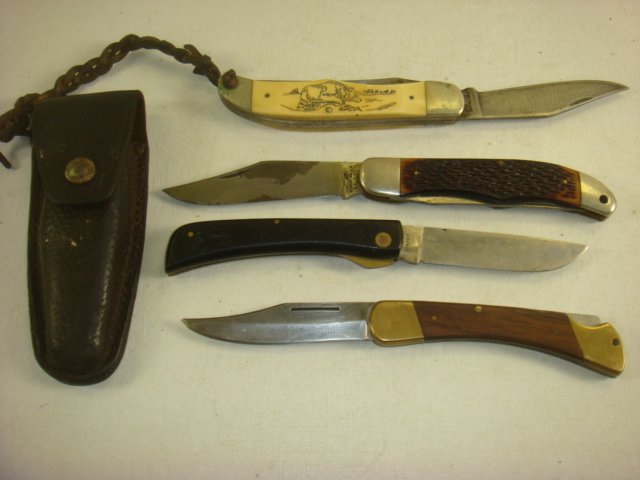 Four Pocket Knives:: Four Pocket Knives: Case XX, Puma, Schrade-Walden and Schrade Bone Handled Pocket Knives. (50-150)