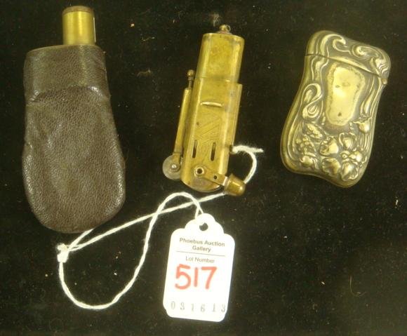 Civil War Era Style Lighter, Powder Bag, & Matchsafe:: Civil War Era Style Lighter, Powder Bag, & Matchsafe: Brass 3" Tall with Flint and Wheel Striker. Military Crest Engraved on Sides with Flame and Stars & Stripes. "Made in the USA". Match safe and Lea