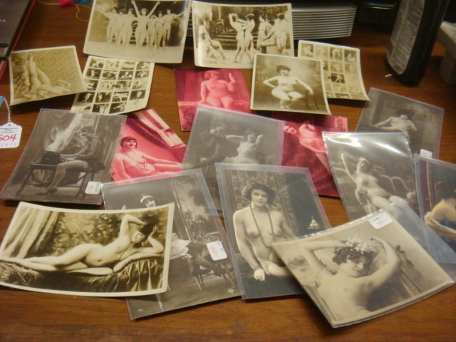 Twenty Eight Pin Up and Naughty Postcards:: Twenty Eight Pin Up and Naughty Postcards: Mutoscope Cards of Pin-Up Girls, 1920's Colored and Monotone, Some Marked Nelly and Leo and One 3-D "Winker" With a Gun Who Disrobes Before Your Eyes. (100-2