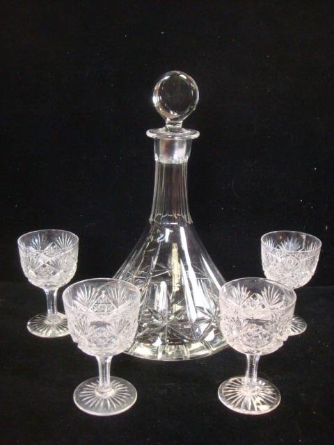 Four HAWKES Cut Crystal Stems and Cut Glass Decanter:: Four HAWKES Cut Crystal Stems and Cut Glass Decanter: Four Hawkes Stems are 4 1/4"T. HAW1 Pattern. Acid Etched Hawkes on Foot. Ships Decanter is 11 1/2"T. Flat star Cut Bottom, Paneled Neck, Round Top