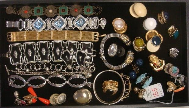 Costume Jewelry Bracelets and Clip Earrings:: Costume Jewelry Bracelets and Clip Earrings: Include Cuff, Spring Clip, Link, Mesh and Middle Eastern. Makers Marks are Kramer and Tara. (100-200)