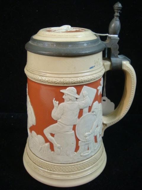 VILLERY & BOCH METTLACH Cameo Relief Stein:: VILLERY & BOCH METTLACH Cameo Relief Stein: #2182. Bowling and Drinking Over Terra Cotta Background. Inset Porcelain Lid with Relief Pipe. 7 3/4"T. Abbey Mark. (300-500)