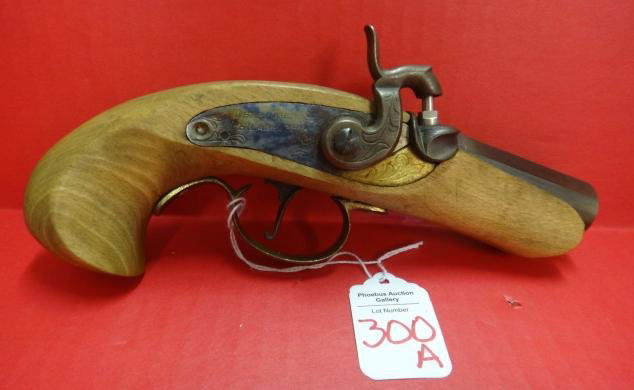 JUKAR "PHILADELPHIA DERRINGER" Percussion Pistol:: JUKAR "PHILADELPHIA DERRINGER" Percussion Pistol: Black Powder Derringer with 3" Blued Barrel and Walnut Stock and Grips. Brass Trigger Guard (Missing Screw). SN 077015. Bidding Begins at $30.00. Blac