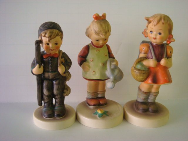 GOEBEL HUMMEL School Girl, Little Gardener, Sweep:: GOEBEL HUMMEL School Girl, Little Gardener, Sweep: School Girl HUM 81/2/0 TMK-6. 4 1/4"T. Flowers in Basket. Little Gardener HUM 74 TMK-5 4 1/4"T. Chimney Sweep HUM 12/2/0 TMK-6, 4"T (60-80)