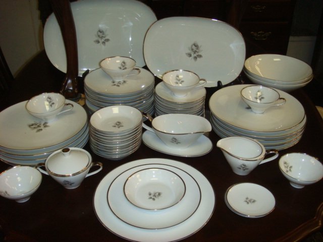 Set of Saladmaster "Remembrance" Dinnerware:: Set of Saladmaster "Remembrance" Dinnerware: Grey Rose at Center, Platinum Rim on all Plates. Includes Twelve Each Dinner Plates, Salad Plates, Berry Bowls, Cups and Saucers, Covered Sugar, Creamer, G