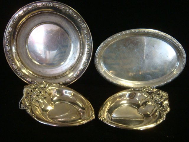 Four Sterling Silver Trays:: Four Sterling Silver Trays: Two Wallace Heart Shaped Dishes Have Reticulated Tab with Rose at Top. International Prelude Oval Tray is 8 3/4"L. Gorham Strasburg Round Tray is 8"D. 15.66 oz. (200-400)