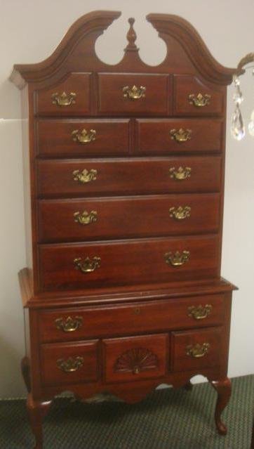 Queen Anne Style Mahogany Highboy:: Queen Anne Style Mahogany Highboy: Broken Arch Pediment Centered by Finial over Five Drawer Top Section-on Four Drawer Lower Chest. Raised on Cabriole Legs, Front and Back. Shaped Apron. Made By Ameri