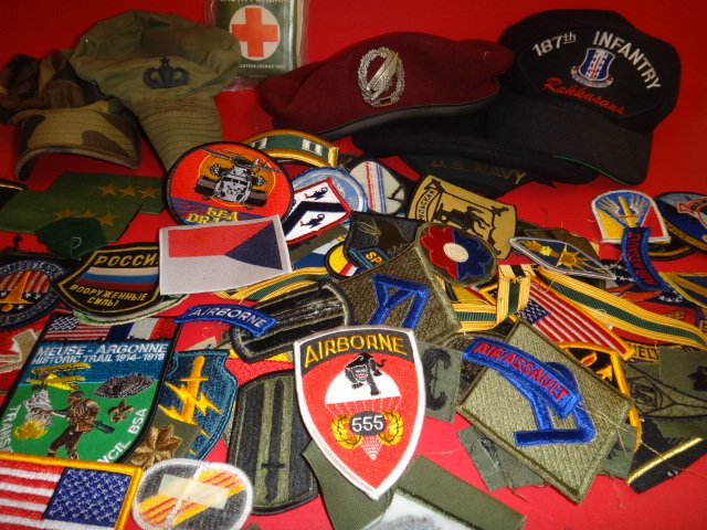 Hats, Insignia & Patches, US and Foreign:: Hats, Insignia & Patches, US and Foreign: German Red parachute Beret, Navy Saucer Cap, Army Patrolling Caps. Patches and Insignia for US and Allied Forces in Bosnia. Special Operations Group Patches. 