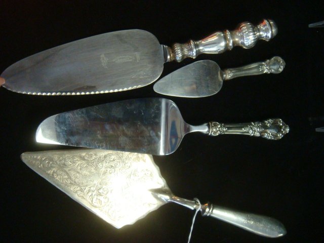 Four Sterling Handled Serving Pieces:: Four Sterling Handled Serving Pieces: Lunt Eloquence 10 3/4"L Pie Server, Raimond 11 1/2"L Pastry Server, Ambassador Cutlery MFG Co 10 1/2" Pie/Cake Server and Web 6 1/4" Cheese Server. (100-150)