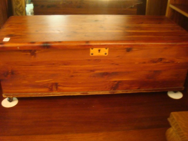 Small Vintage Cedar Chest with Wooden Handles:: Small Vintage Cedar Chest with Wooden Handles: Solid Cedar Chest is 14 1/2"T X 42" X 18" on Casters. Brass Keylock (No Key). (80-120)