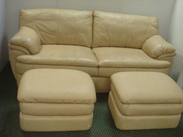 HAVERTIES Tan Leather Sofa with Two Matching Ottomans: HAVERTIES Tan Leather Sofa with Two Matching Ottomans Double Cushion Attached Seat and Back with Stuffed Cushion Arm Rests (pillows). Pair of Matching Triple Tier Ottomans. No Tears. Sofa 88" Arm to A