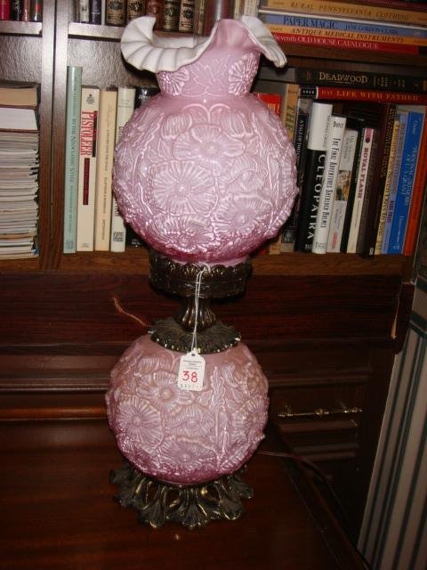 Gone with the Wind Puffy Lamp:: Gone with the Wind Puffy Lamp: Pink Floral Puffy Glass Ruffled Globe and Base. Base & Bottom Light. Pierced Brassed Metal Leaf Form Foot and Stem. Glass Chimney. 24"T to Top of Chimney. (200-400)