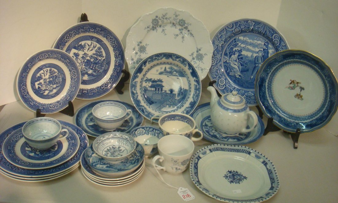 Collection of Blue and White China:: Collection of Blue and White China: 10 Piece Homer Laughlin Blue Willow, Welden Cup/Saucer/Plates, 6 Chinese Rice Kernel, Metlock Plate, Winterthur Plate, Spode Woodman Plate and More. (60-120)