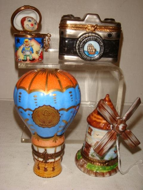 Assorted Gift Group of Hand Painted Limoges Boxes:: Assorted Gift Group of Hand Painted Limoges Boxes: Includes: Windmill, 3"T, Hot Air Balloon, 3 1/2"T, Camera with Photo, 2"T, Jack in the Box with Pop Up inside, 1 3/4"T. (100-200)