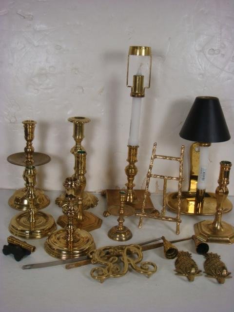 Collection of Nine Brass Candlesticks:: Collection of Nine Brass Candlesticks: Various Styles and Sizes, Candlesnuffers, Trivet and Picture Holder. 3 Electric Candle Style Lights. (100-200)