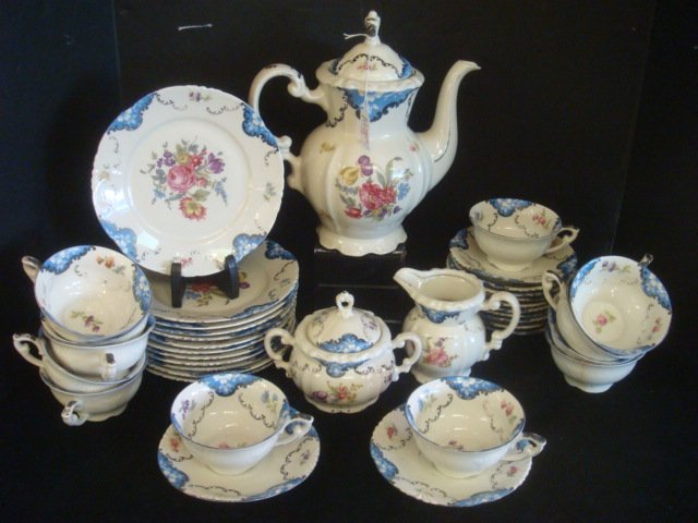 MITTERTEICH Bavarian Tea Set:: MITTERTEICH Bavarian Tea Set: Service for 12 Includes Teapot, Lidded Sugar, Creamer, 12 Each Cups, Saucers and 7 3/4"D Plates. Blue Scallop Pattern with Floral Transfers. One Cup is Repaired. (200-400