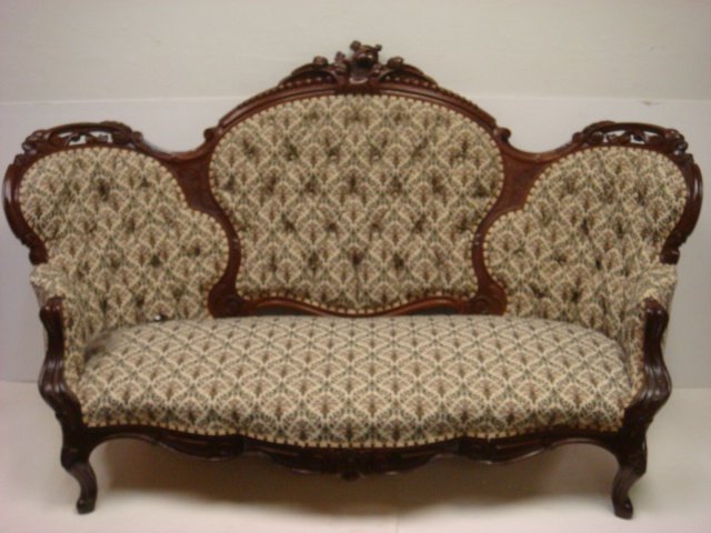 Cuban Mahogany Baltimore Rococo Revival Sofa:: Cuban Mahogany Baltimore Rococo Revival Sofa: Elaborate Carved Frame with Scrolls, Flower Foliage, Open Carving on 3 Section Button Tufted Back. Original Stuffing. St. Andrews Scottish Tapestry Uphols