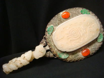 Asian Hand Mirror with White Jade Medallion:: Asian Hand Mirror with White Jade Medallion: Silver Frame with White Jade Relief Carved Dragons on Back with Green Jade Carved Leaves and Carnelian Cabochons Surrounding. Handle with Additional