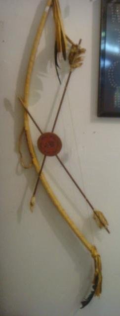 Bow and 2 Stoned Headed Arrows:: Bow and 2 Stoned Headed Arrows: Soft Leather Wrapped Bow with Two Stone Tipped Arrows (One Damaged) Bow 44" Tall and Arrows 29" Long. (100-250)