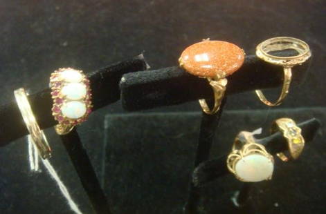 Six 10KT Gold Rings:: Six 10KT Gold Rings: Goldstone, Prong Set. Opal and Garnet, Prong and Bezel Set. Prong Set Opal in Draped Rope Setting. All Size 8. 7 1/2 Yellow Gold with Citrine, Amethyst and Zircon Stones. Size 13