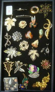 Assortment of Ladies Costume Pins:: Assortment of Ladies Costume Pins: Rhinestone, Marquesite, Enamel, China, Stone and More. Avon, Coro and Eugene Among Makers. Bug Trembler, 925 Sterling Bar Pin and Loose Stones. (100-200)