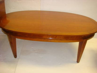 Cherry TOMLINSON Parkway Terrace Cocktail Table:: Cherry TOMLINSON Parkway Terrace Cocktail Table: Mid Century Oval Coffee Table is 29 1/2" X 47", 16"T. Square Tapering Legs. (100-200)