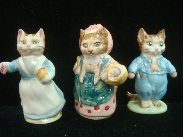 Three BESWICK Beatrix Potter Cat Figurines:: Three BESWICK Beatrix Potter Cat Figurines: Tom Kitten Copyright 1948, Tabita Twichett Copyright 1961 and Cousin Ribby Copyright 1970, All Issued 1974-1985. (100-200)