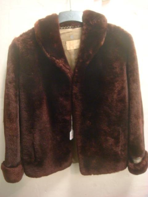 Dark Brown Mouton Lamb Fur Jacket:: Dark Brown Mouton Lamb Fur Jacket: Shawl Collar with Cuffed Sleeves. Makers Label Freeman's. Taupe Embroidered Lining, Slash Side Pockets. 24" Shoulder to Hem. Soft Plush Warm Fur. (60-100)