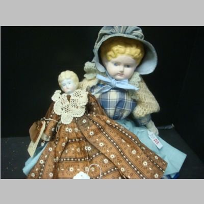 MOLDED PAPIER MACHE & BLONDE China Head Dolls: 17"T: MOLDED PAPIER MACHE & BLONDE China Head Dolls: 17"T 17" Tall, Replaced Leather Hands, New Body & Clothes. China Head Butterfly Blonde Hair, Possibly Replaced Body, Bisque Hands & Feet. 12"T, Cir 1869 