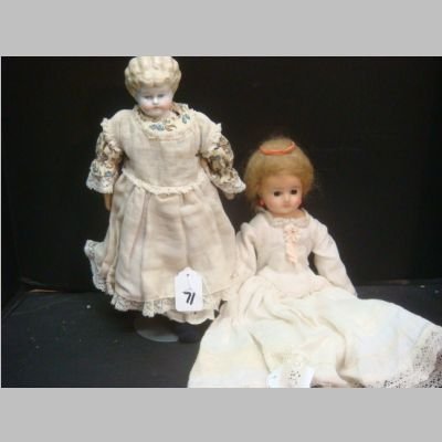 WAX OVER PAPIER MACHE & China Head Dolls:: WAX OVER PAPIER MACHE & China Head Dolls: Mohair Wig, Glass Eyes, Replaced Body, Original Legs, 13"T. China Head Has One Wax Arm, Oil Cloth Body, Shoulder Plate, Original Slip, 12"T. (100-200)