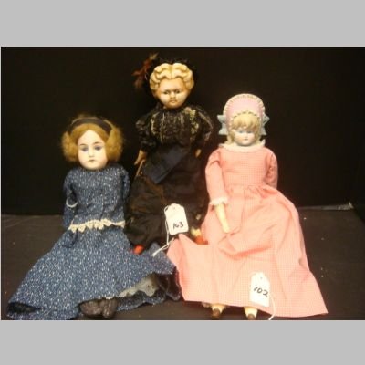 BISQUE, PAPIER MACHE & BONNET Head Dolls: 12"T: BISQUE, PAPIER MACHE & BONNET Head Dolls: 12"T 12' Tall Marked 11/0 Hairline Crack on Head, Replaced Leather Body & Wig. 12"T Papier Mache, Glass Eyes, Wooden Hands, Has Crazing, Paint Loss. Originall