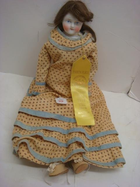 UNGLAZED PARIAN Head Doll:: UNGLAZED PARIAN Head Doll: Shoulder Plate, Gusseted Jointed Cloth Body & Legs. Replaced Arms, Matte Finish, Comes with 4th Place Ribbon, 20"T. (150-200)