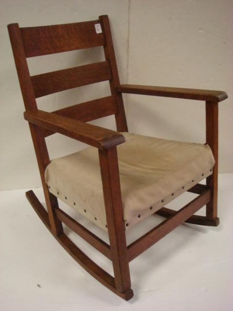 STICKLEY BROS Oak Arts and Crafts Rocking Chair:: STICKLEY BROS Oak Arts and Crafts Rocking Chair: Triple Ladder Back Rocker with Open Arms. Original Finish. Reupholstered Fabric Seat. Metal Label. 1904-1928. (400-600)