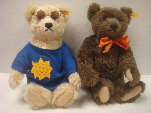 Two STEIFF Teddy Bears with Growlers:: Two STEIFF Teddy Bears with Growlers: Sunny with Sunglasses and T-Shirt No 665691. Button and Tag in Ear. One of the 4 Seasons Bears. Brown Bear #665677 with Growler and Orange Ribbon. Button and Tag