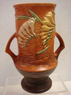 ROSEVILLE FREESIA Vase:: ROSEVILLE FREESIA Vase: Floral Clusters With Blade-Like Leaves on Shaded Background of Tangerine. Small Chips On Rim. #123-9", Cir. 1945. (75-125)