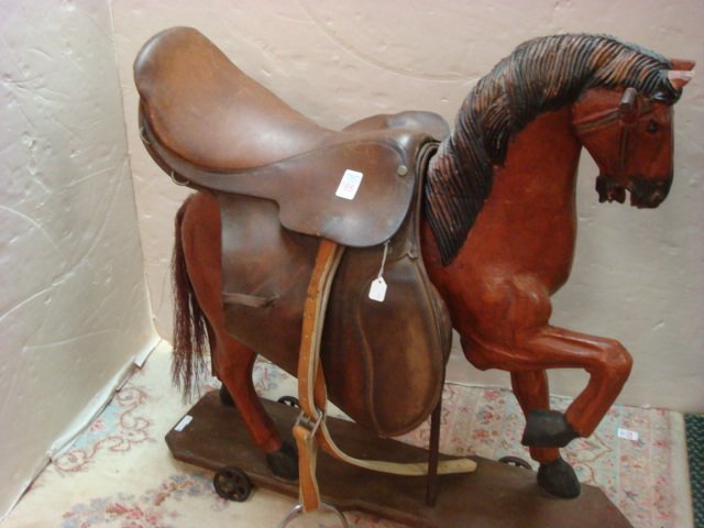 English CROSBY & CO LTD Leather Riding Saddle:: English CROSBY & CO LTD Leather Riding Saddle: 17" Plain Flap with Stirrup Irons, Girth Tabs Stirrup Keeper and Cinch Strap. Accented with Nail Heads. Strong Brand Name, Circa 1970's. (200-300)