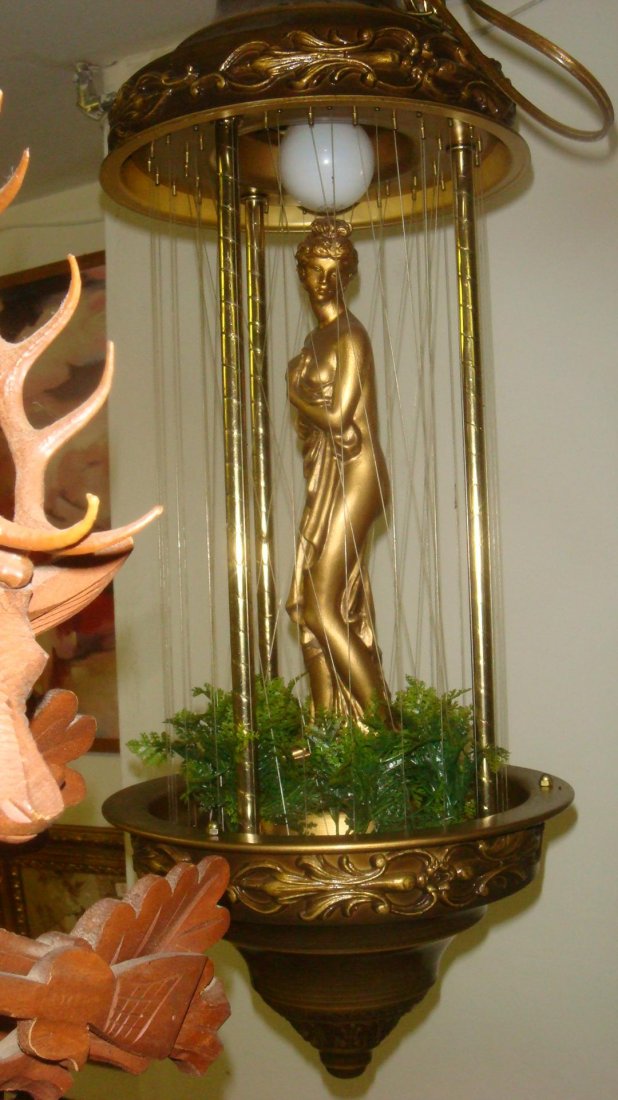 Vintage Goddess Rain Swag Lamp:: Vintage Goddess Rain Swag Lamp: Oil Runs Down Strands to Mimic a Rain Effect. Ca 1970's. 34"L. (100-200)