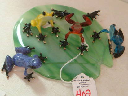 TIM COTTERILL BRONZE MINI SET WITH LILLYPAD:: TIM COTTERILL BRONZE MINI SET WITH LILLYPAD: 4 Frogs & Lillypad; "Sky", Blue Painted Frog Looking up to the Heavens. Released in 2006; 803/5000, COA Included. "Sunset", Painted a Fiery Orange/Red is