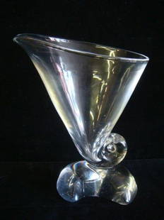 STEUBEN Cornucopia Crystal Vase by Donald Pollard:: STEUBEN Cornucopia Crystal Vase by Donald Pollard: Ca 1964. Vase is 7 1/2"T. Etched Script Steuben on Bottom. Minor Scuff Marks on Bottom Consistent with Age. Designed by Donald Pollard. (180-250)