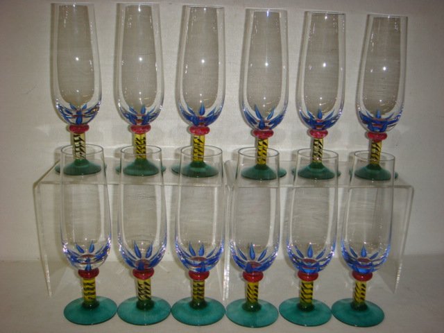 12 KOSTA BODA Ken Done Palm Trees Champagne Flutes:: 12 KOSTA BODA Ken Done Palm Trees Champagne Flutes: Ca 199-2003. Handpainted Stems by Ken Done Australian Artist. Etched on Bottoms Kosta Boda Ken Done 24221. 7 1/4"T. Green Foot, Yellow Stem. Signed